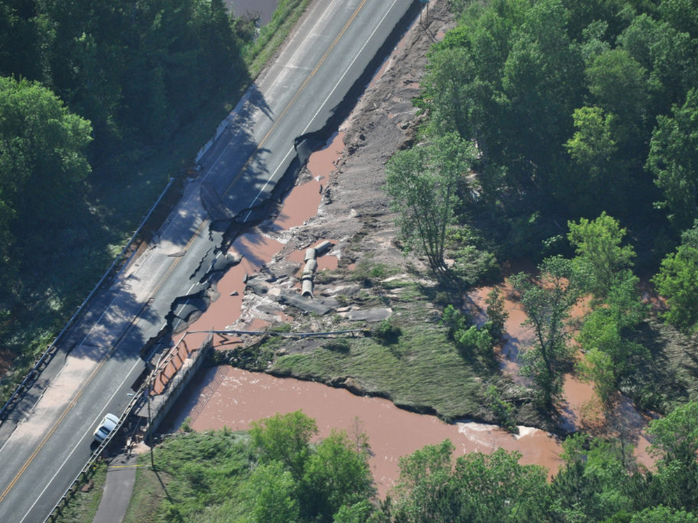 science-climate-flooding-money-infrastructure-costs-ashland-2016-badriver-culvert.jpg